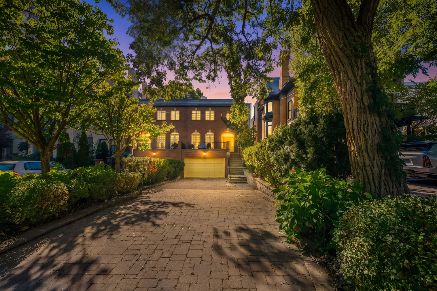 45 Heath St W at dusk, viewed from the heated driveway